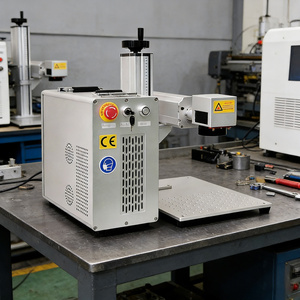 Máquina de Marcado Láser de Fibra Portátil Compacta de 50W, Grabado Rápido, Compatible con DXF/BMP/AI/DST, Refrigerada por Aire, para Uso Industrial - Product Image 1