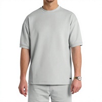 T-shirt à manches courtes gris clair uni et décontracté pour homme, ensemble 2 pièces assorti à un short, tenue de sport pour la salle de sport et l'entraînement