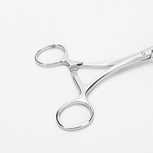 Pinza de lengua Lijian de acero inoxidable de 17 cm, instrumento dental manual para uso adulto y pediátrico - Product Image 1