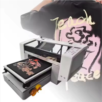 Machine d'impression numérique automatique directe sur vêtement DTG DTF à double usage pour l'impression de t-shirts, de sweats à capuche et de jeans
