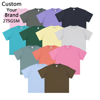 T-shirt personnalisé en coton 100% noir, coupe oversize, avec broderie graphique et impression numérique, pour homme