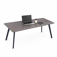 Bureau de direction moderne et contemporain avec plateau en bois à coins arrondis et pieds en acier, idéal pour la maison et le lieu de travail