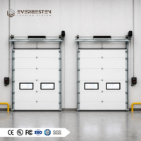 Porte sectionnelle industrielle en acier Everbesten, panneaux isolés de 40 à 100 mm, protection anti-chute, fonctionnement manuel/électrique