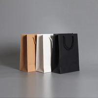 Bolsa de papel de regalo de lujo con logotipo impreso personalizado al por mayor bolsas de papel de compras de boutique al por menor con su propio logotipo