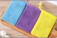 Vente en gros pochette de sac à savon en nylon filet africain personnalisé Ghana sac de douche exfoliant de bain en éponge avec cordon ruban