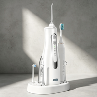 Ensemble de soins bucco-dentaires portable Brosse à dents sonique à poils doux et irrigateur buccal IPX7 étanche pour les voyages et la maison Combo 2 en 1