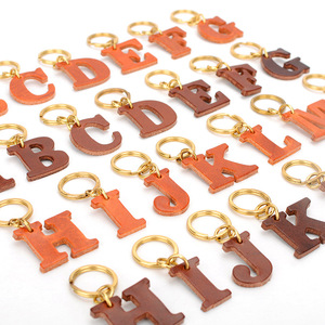 Genuine <strong>Leather</strong> Retro Unisex Cowhide <strong>Key</strong> <strong>Chain</strong> Letter Pendant Custom Design Eco-friendly Gift for Earth Day - Product Image 1