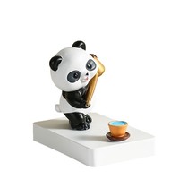 Nouveaux produits 2024 yiwu panda artisanat panda ornements ornements de jardin sculpturaux support de support de téléphone portable décoration de la maison