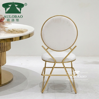 Chaises de salle à manger modernes pour événements et banquets, en métal doré finition miroir, dossier rond, rembourrage doux, pour restaurants commerciaux et extérieur