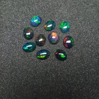 Opale noire d'Éthiopie naturelle de qualité supérieure Grade AAA, forme ovale 8x10 mm, cabochon 1,80 carat, pierre précieuse en vrac avec jeu de couleurs/effet de feu