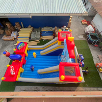 Château gonflable commercial à thème Patte d'ours avec toboggan et jeux gonflables