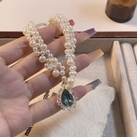 Colliers en perles d'imitation de style français pour femmes, légers et extravagants, avec des gouttes de cristal bleu, chaîne de clavicule, bijoux