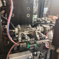 Machine automatique de fabrication de bouteilles et de pots en plastique PET pour boissons, eau et jus, par soufflage et étirage