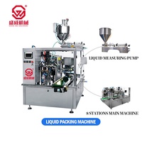 Machine de remplissage automatique pour liquides visqueux (miel, jus) en sachets, avec dispositif rotatif pour sachets à bec verseur et sachets en aluminium