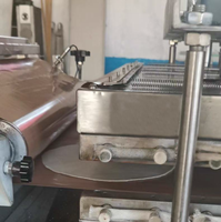 Machine automatique de fabrication de tortillas de roti/chapatti/pakistanais à farine de grande capacité Machine de fabrication de carapaces de rouleaux de poulet mexicain