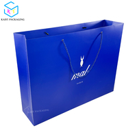 Sac à provisions en papier personnalisable pour vêtements et bottes, sacs d'emballage en papier imprimé de haute qualité avec poignées