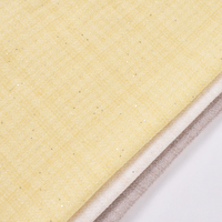 Tissu en tweed mélangé de laine, léger et respirant avec une texture unie, adapté aux vêtements pour femmes.