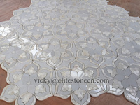 Mosaïque de carreaux en marbre à motifs floraux pour salle de bain