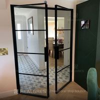 Porte battante en verre avec cadre en acier Realgres, bordure ultra-fine, verre trempé transparent, porte de suite d'hôtel
