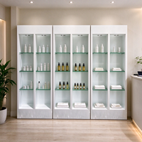Vitrine d'exposition en verre LED MDF blanc de luxe, sur mesure, pour salon de beauté, présentoir cosmétique pour produits de soin de la peau, magasin de vente au détail