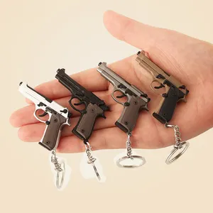 Брелок для ключей с металлическим пистолетом