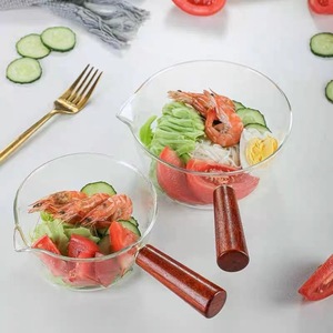 Casserole en verre borosilicaté à une poignée avec manche en bois, convient aux cuisinières à gaz et aux tables de cuisson à <span class=keywords><strong>induction</strong></span>. - Product Image 1