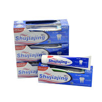 Dentifrice de qualité du fabricant personnalisé, dentifrice en gel rayé blanchissant les dents à saveur de menthe avec une brosse à dents emballée