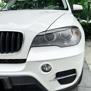 Pegatina para Cejas de Faros Delanteros BMW X5 E70 2008-2013, Textura de Fibra de Carbono Negro Piano, Adhesivo Decorativo para Carrocería - Product Image 1