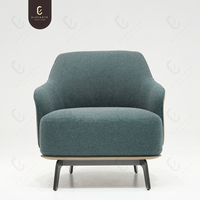 Fauteuil de loisir moderne en tissu et cuir rembourré