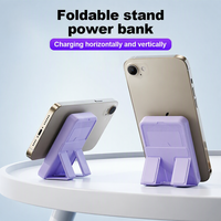 Power Bank Mini Nirkabel Magnetik 2 in 1 dengan Layar Digital, Output Multi-line 15W 10000mAh, Penyangga Ponsel, Laris Terjual