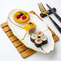 Plateau de service en céramique en forme de feuille avec bordure dorée de luxe |   Assiette ovale en porcelaine pour dessert, sushi et décoration intérieure
