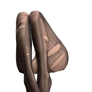 Libera tu lado salvaje con estas medias grises de azafata, medias desgarrables, ultrafinas, perfectas para discotecas. - Product Image 3