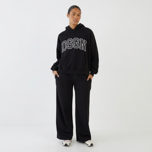 Ensemble survêtement décontracté pour femme : sweat à capuche oversize noir et pantalon large, imprimé graphique, style streetwear deux pièces - Product Image 1