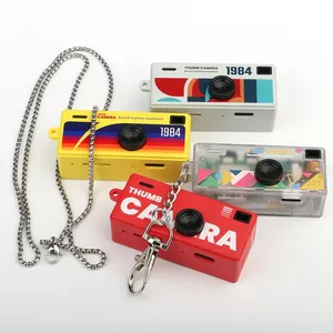 Mini caméra d'action G6 Thumb Keychain, écran 0,96 pouce, style rétro, compatible carte mémoire, enregistreur vidéo 1080P, très petite caméra. - Product Image 1
