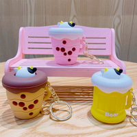 Porte-clés souple en forme de tasse de thé au lait de vache de dessin animé, mignon et amusant, anti-stress, pendentif, cadeau pour sac à dos, boîte mystère, vente en gros, jouet fidget de bureau