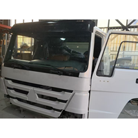 Ensemble complet de cabine de camion HOWO HW76, cabine de camion à benne basculante Sinotruk avec tableau de bord intérieur et pièces de rechange