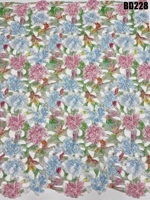 Tissu en dentelle guipure à découpe florale colorée 100% polyester brodé pour robe de mariée mexicaine et fête