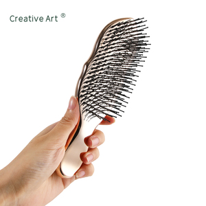 แปรงหวีผมไนลอนเคลือบไฟฟ้าแบบหรูหราสำหรับผู้หญิง ยี่ห้อ OEM ผลิตภัณฑ์ส่วนตัว สำหรับจัดแต่งทรงผม รุ่นญี่ปุ่น - Product Image 5