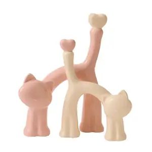 Adornos creativos de gato abstracto de estilo crema, decoración de cerámica para el hogar en forma de Animal para sala de estar, decoración única para el hogar