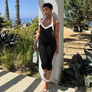 จั๊มสูทผู้หญิงแบบสั่งทำพิเศษ รุ่นปี 2026 เอวสูง แขนกุด คอวี ทรงเข้ารูป ชุดถักนิตติ้งสำหรับงานปาร์ตี้ - Product Image 2