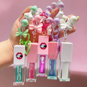 Brillo labial vegano rosa a prueba de agua, libre de crueldad animal, con lazo y llavero, etiqueta privada, DIY, aceite labial, brillo labial con pompón, venta al por mayor - Product Image 1