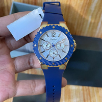 Montre pour femme avec cadran blanc en quartz, bracelet en caoutchouc, boîtier en acier inoxydable de 38 mm, chronographe, affichage de la date et du jour de la semaine