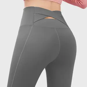 Calça de ioga feminina de nylon spandex, calça esportiva de cintura alta com costas cruzadas, logotipo personalizado de alta qualidade para academia e academia, calça completa esportiva