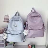 Nouveau Sac à Dos Unisexe Élégant et Respirant en Nylon Couleur Unie Grande Capacité avec Bretelles à Coussin d'Air pour Filles et Femmes du Collège et Lycée