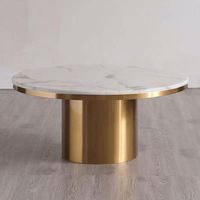 Table basse moderne mobile en acier inoxydable doré avec plateau en fausse pierre blanche