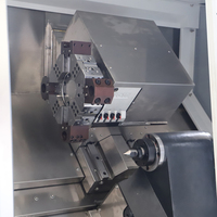 Machine-outil CNC de haute précision TCK50 Centre de tournage à lit incliné avec système Fanuc pour tour à usage moyen et CNC Tornos