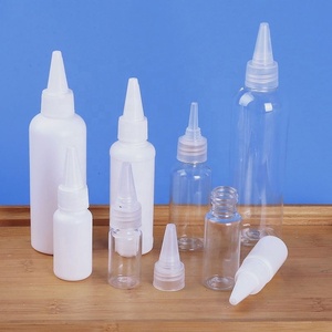 Botella vacía de plástico PET transparente con tapa giratoria y aplicador de presión para aceite capilar, de 1oz, 2oz, 3oz, 4oz, 5oz, 8oz y 10oz - Product Image 1