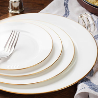 Assiettes à dîner en porcelaine écologiques de qualité supérieure avec bord doré, assiettes blanches durables pour les banquets de mariage, la restauration