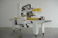Machine de fermeture et d'étanchéité automatique de boîtes en carton, petite, électrique, avec tête de ruban adhésif de 50 mm pour les applications de boissons et de produits chimiques