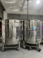 Réservoir de stockage mobile en acier inoxydable avec roulettes pour usage en laboratoire